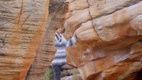 hiker walking through the rocky mountain 4k