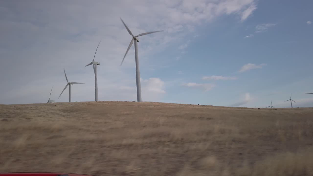Wind Turbines on a Hilly Landscape