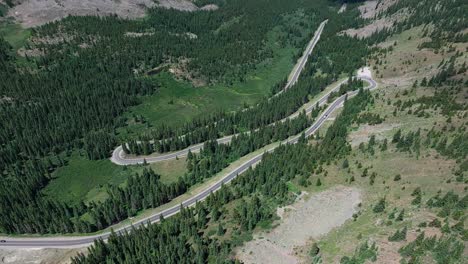 Aerial-over-a-winding-road-near-Cottonwood-Pass,-Colorado,-USA