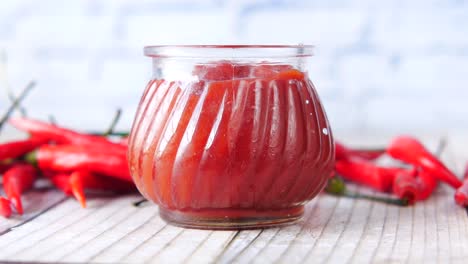 chili sauce in a glass jar