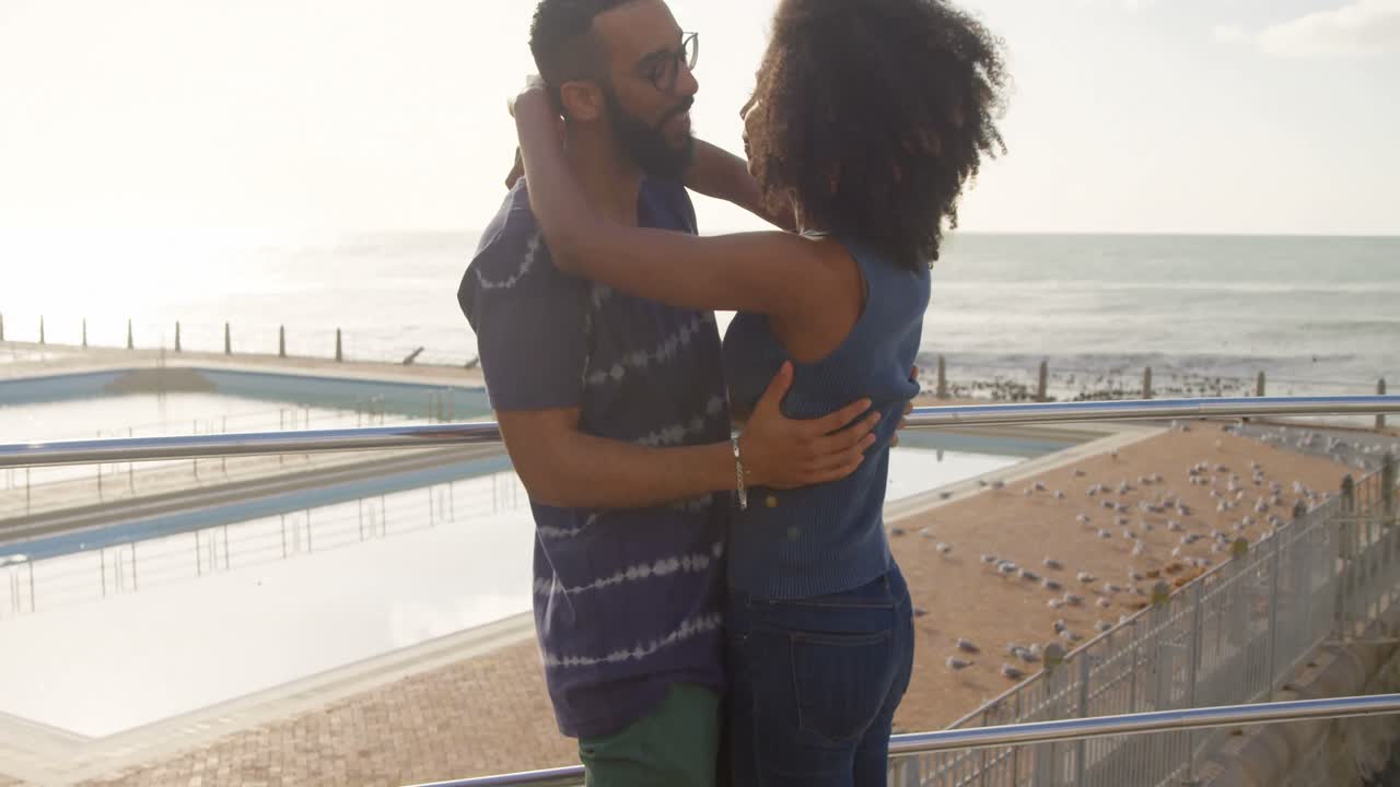 Couple embracing each other at beach 4k