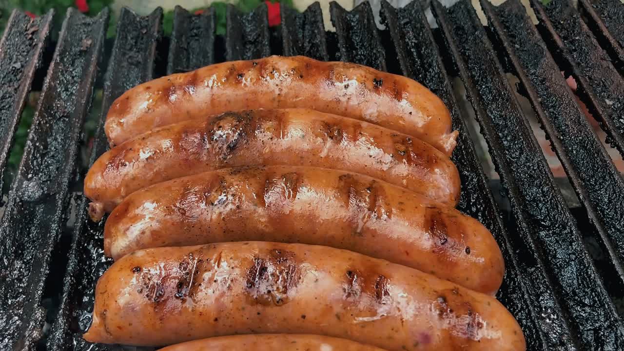 Sausages on hot grill