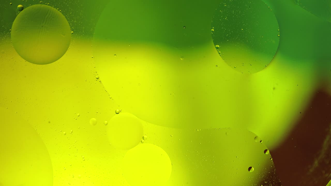 la macroestructura de las burbujas de aceite coloridas. movimiento caótico. fondo multicolor abstracto. patrón