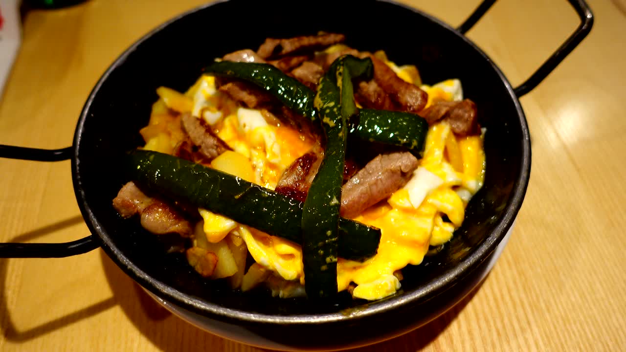 The pork baked with potato, Madrid.