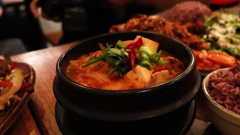 kimchi soup served with side dishes