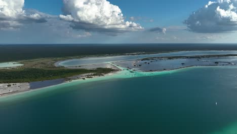 aerial view towards boats at the pirates channel, in the bacalar lagoon, sunny mexico