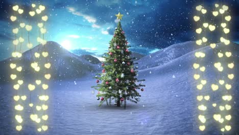 Animation-of-snow-falling-over-hanging-fairy-lights-and-decorated-christmas-tree-on-winter-landscape