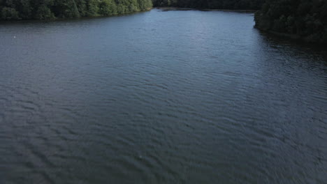 Trémelin-or-Tremelin-lake-and-surrounding-forest,-Brittany-in-France-1