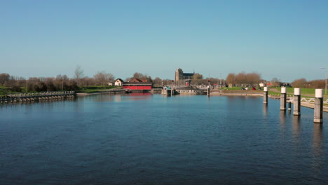 Aerial:-The-locks-of-the-Canal-through-Walcheren,-near-the-historical-town-Veere