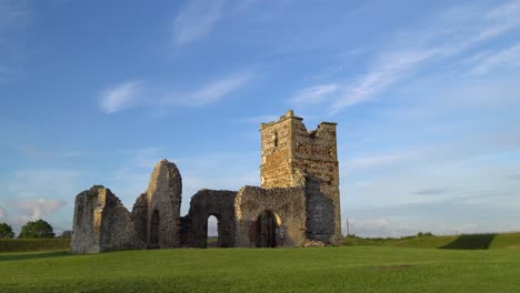 Knowlton-Church,-Dorset,-England.-Slow-pan,-morning-light