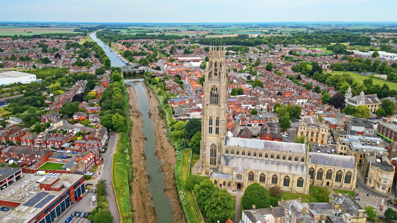 scenic beauty of Boston, Lincolnshire, in mesmerizing aerial drone footage: Port, ships, Saint Botolph Church , Saint Botolph's Bridge