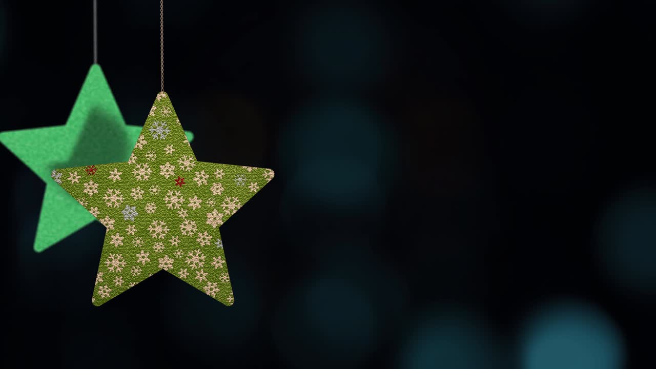 los adornos de las estrellas de navidad se mueven en el fondo de bokeh.
