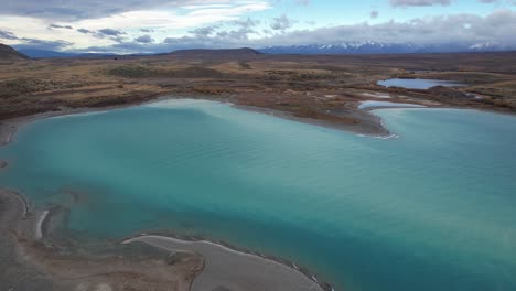 panoramic view of lake tekapo in south island, new zealand - drone shot