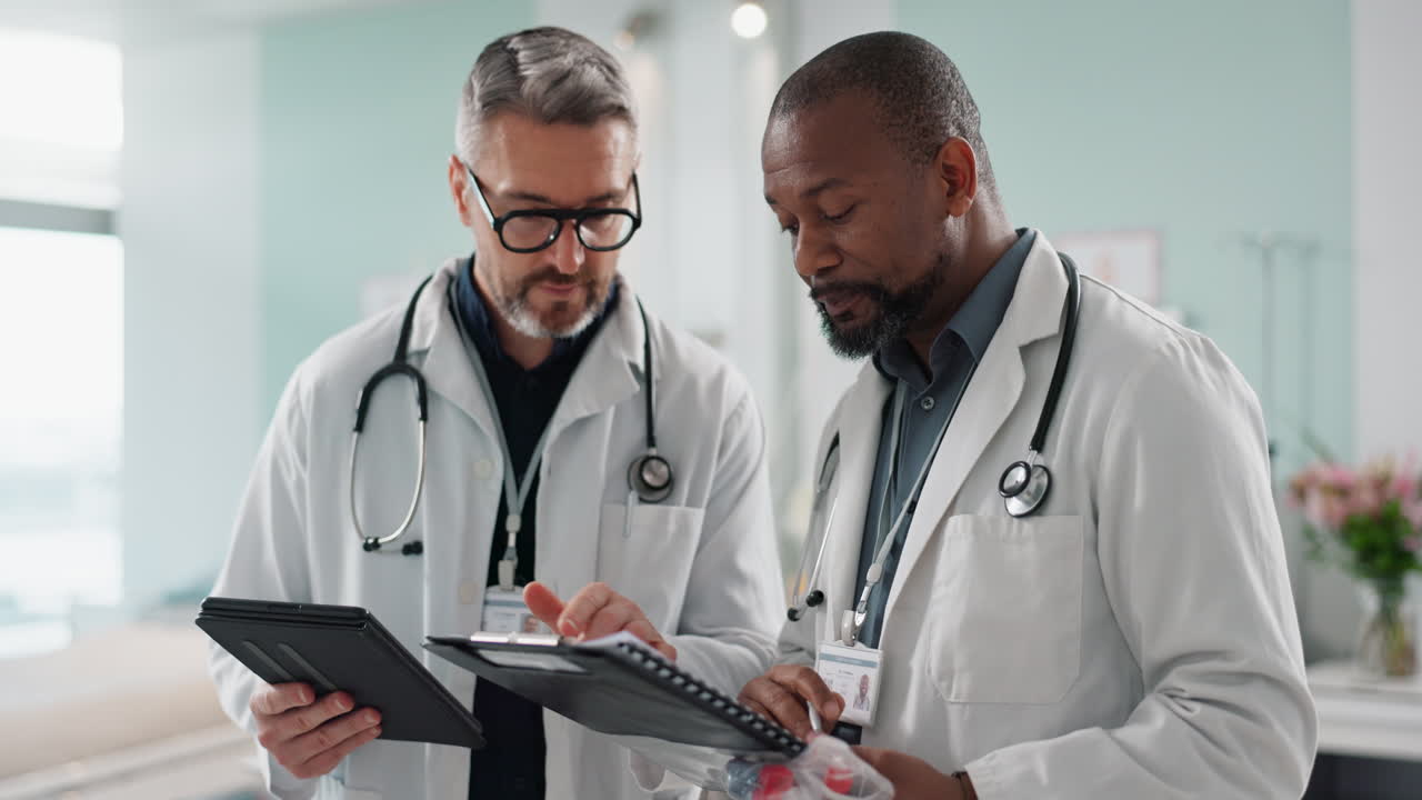 Doctors, men and tablet for team discussion