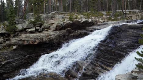 the beautiful provo falls waterfall in the uinta wasatch cache national forest in utah on an overcast evening