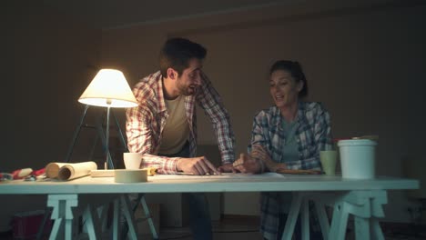 couple checking the project of their new house