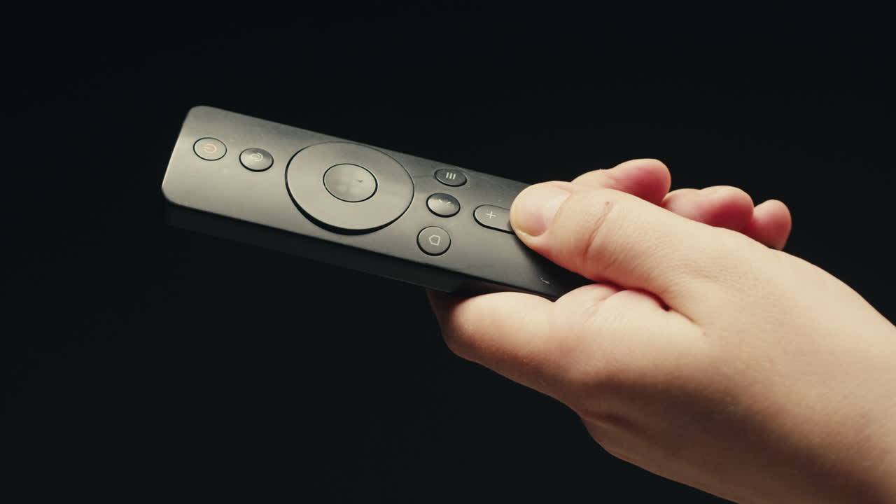 Adding silver batteries AA and AAA in remote controller TV close-up. Batteries are common in portable electronic devices. An AA battery is composed of a single electrochemical cell that may be either a primary battery or a rechargeable battery. Several different chemistries are used in their constru