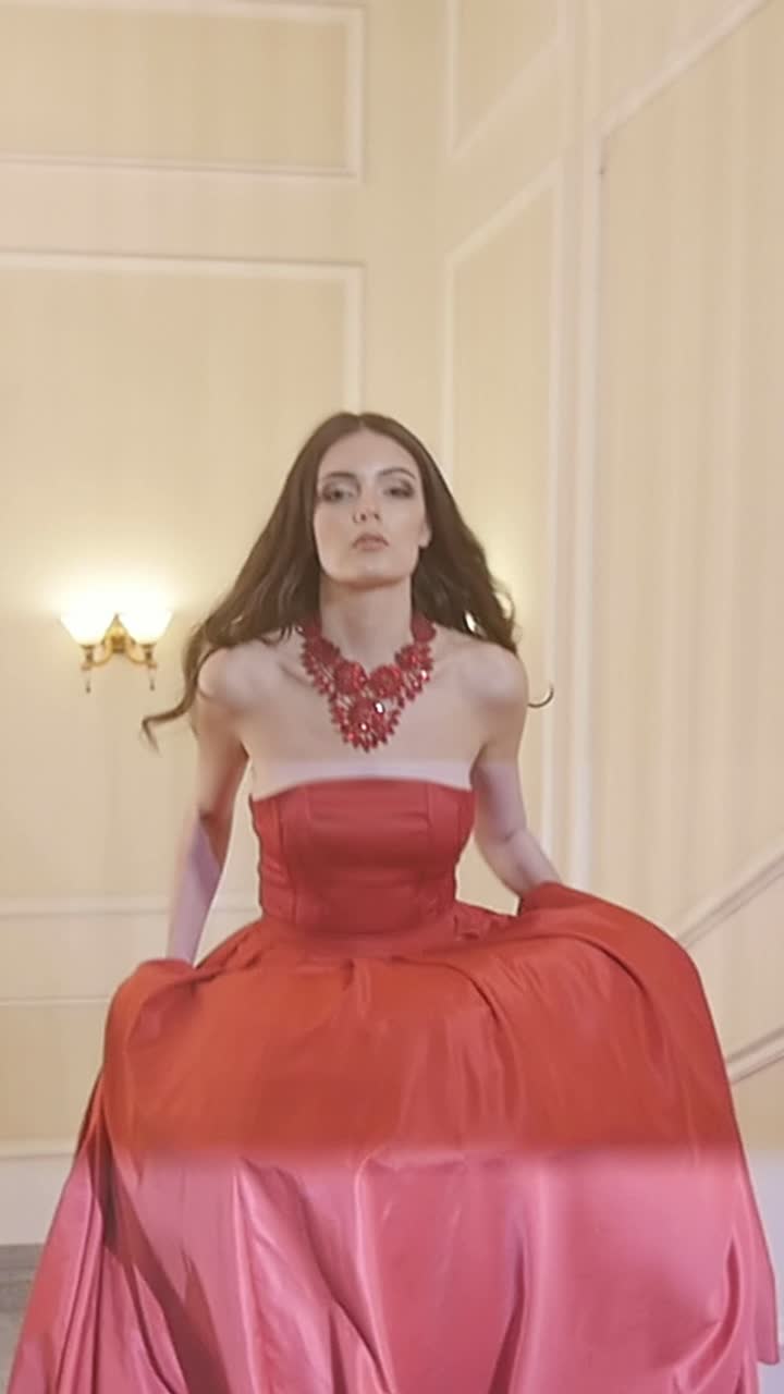 Elegant Woman in Red Ball Gown