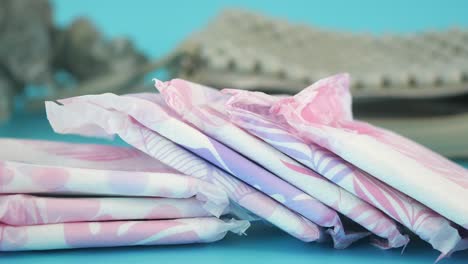 close up of sanitary pads on a blue background