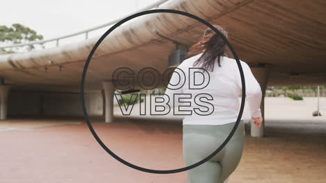 animation of good vibes text in black circle outline over woman running in city in background