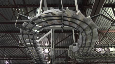 newspapers flow along an assembly line in a newspaper factory