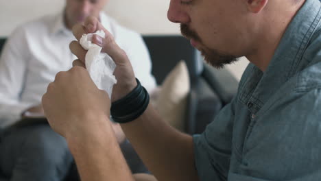 crying man talking in therapy