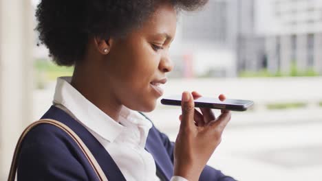 African-american-businesswoman-talking-on-smartphone