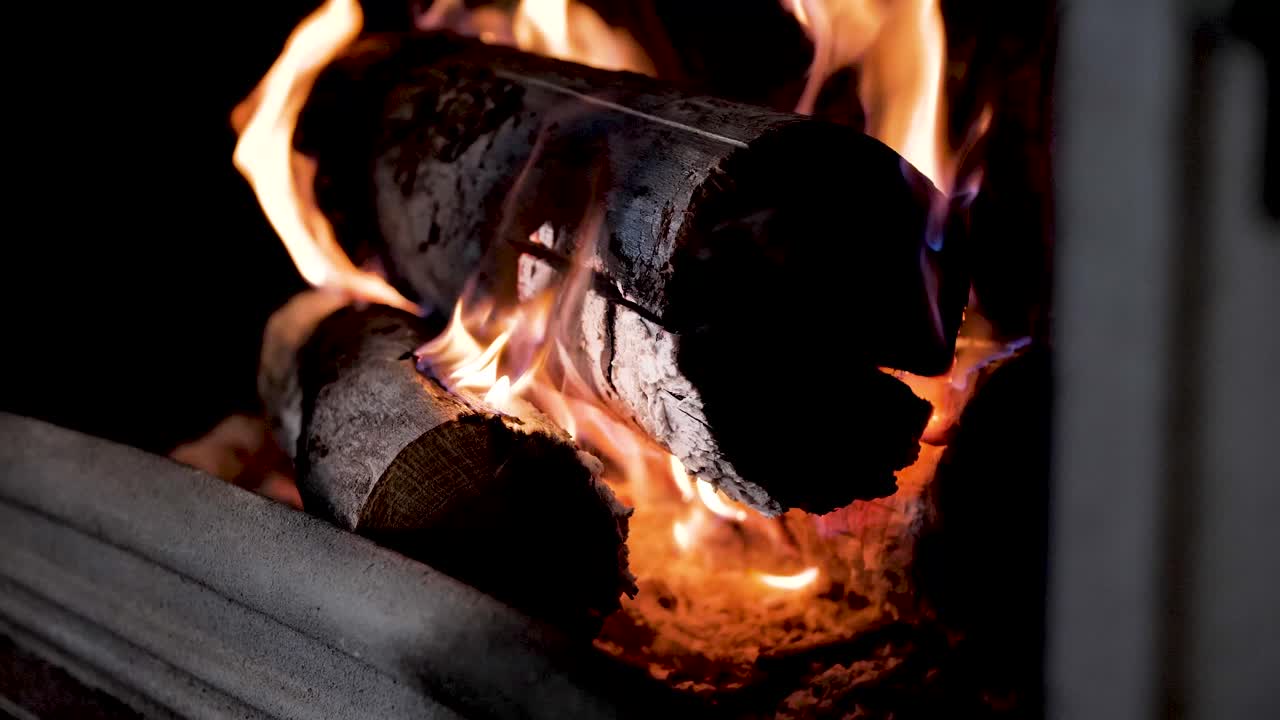 Close-up of Burning Logs in a Fireplace