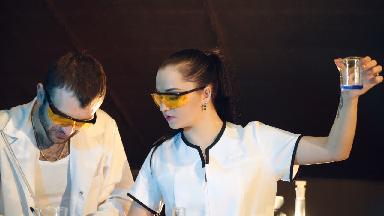 Scientific discoveries. Two modern scientists working in the medical laboratory were engaged in research.