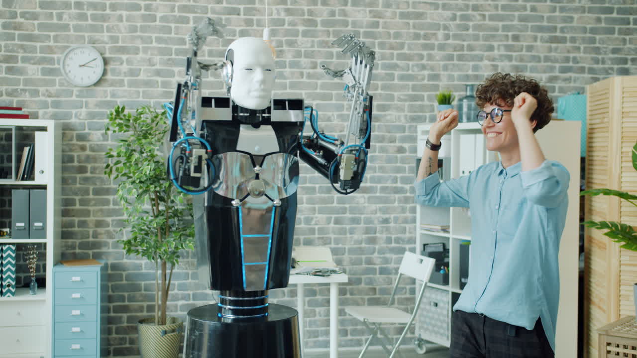 Robot and Woman Dancing in an Office