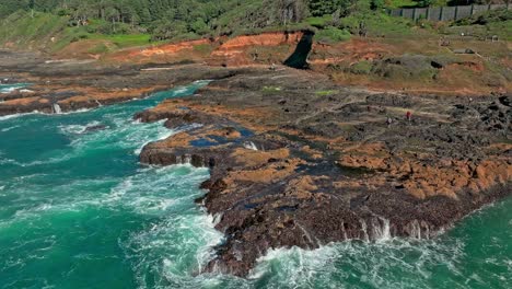 located in the cape perpetua scenic area, just three miles south of yachats oregon, thor's well is a bowl-shaped hole carved out of the rough basalt shoreline