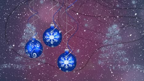 Animation-of-snow-falling-over-hanging-christmas-bauble-decorations-against-purple-background