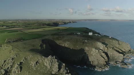 aerial view over the craggy shoreline at lizard point in cornwall, england