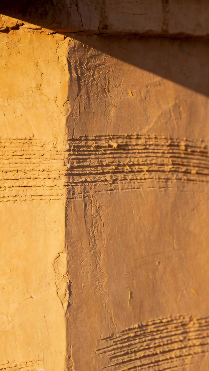 Camera panning plaster panel, showing two-tone texture, grooves, triangular shadow for designers