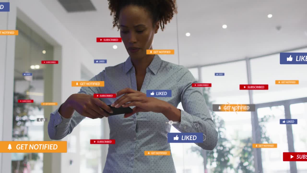 Animation of social media icons and numbers over biracial businesswoman