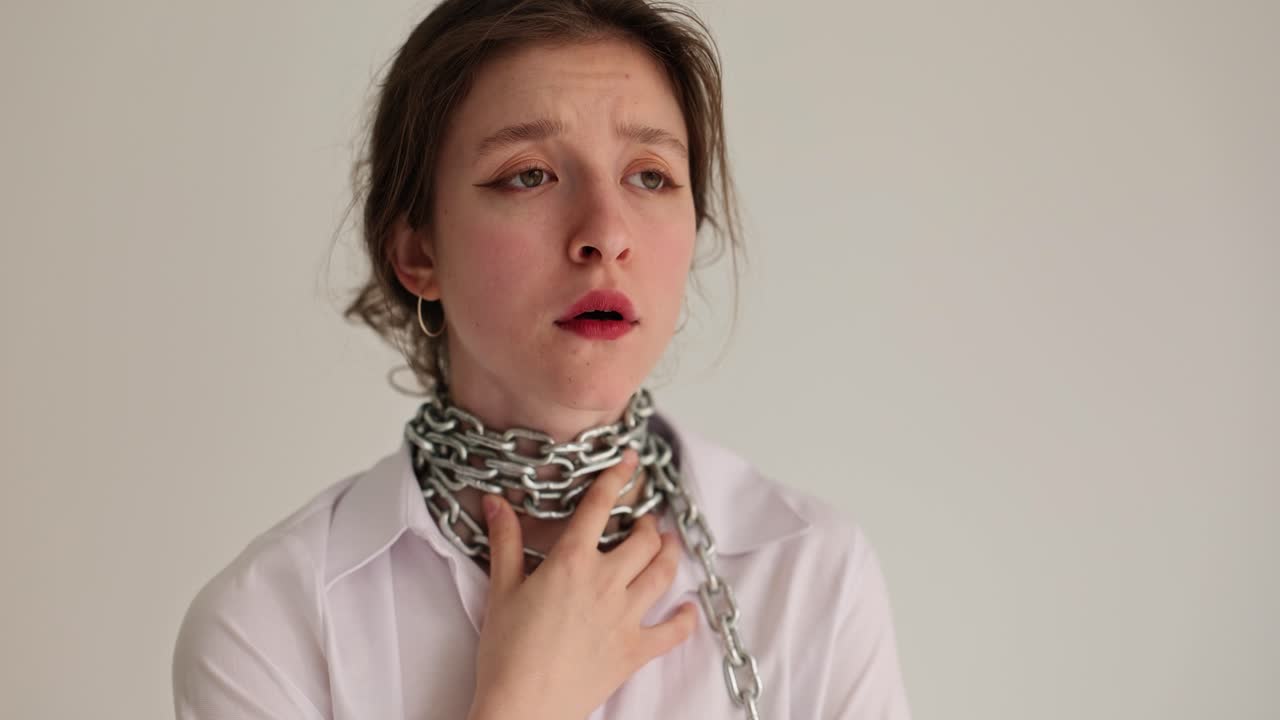 Woman with chain around her neck