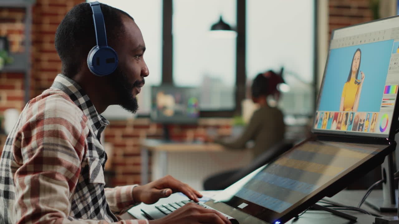Graphic designer expert editing pictures on touchscreen monitor