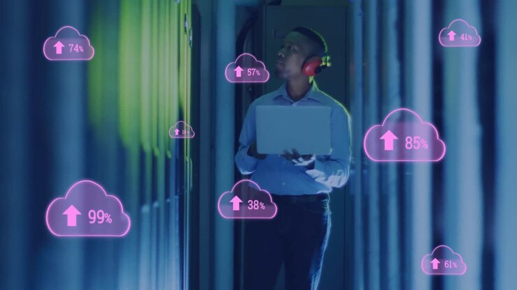 Animation of cloud with uploading over african american man working in server room