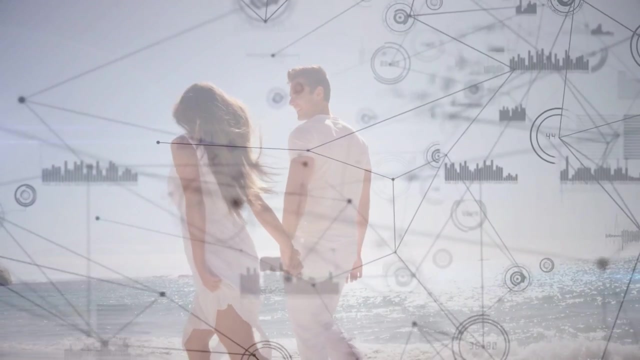Camera pulling back showing couple sharing beach walk with net nodes scaling over them tech design
