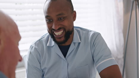 healthcare worker laughing in a bright room