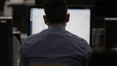 young man working on his computer