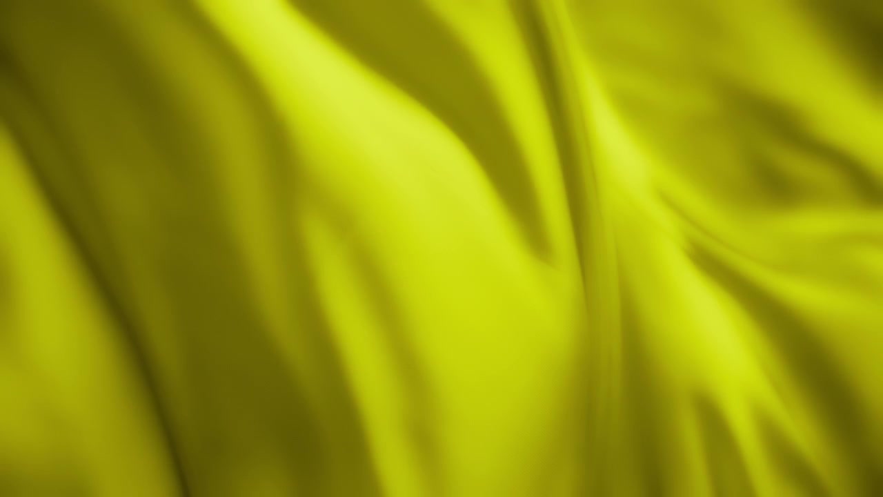 Tessuto in chiffon ondulato color lime che fluttua nel vento