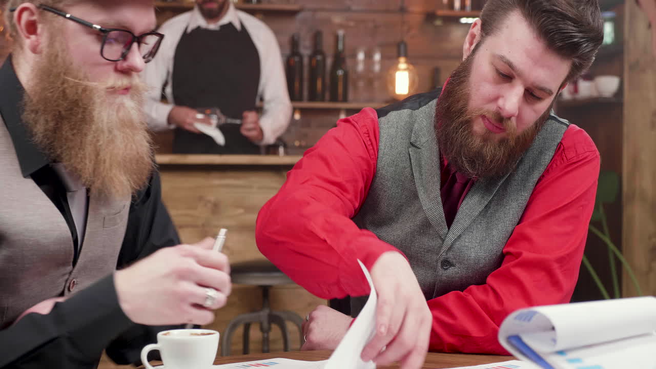 Men having a meeting at a cafe