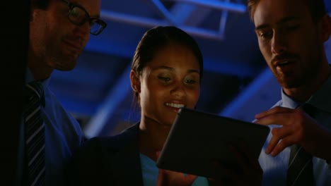 businesspeople using digital tablet