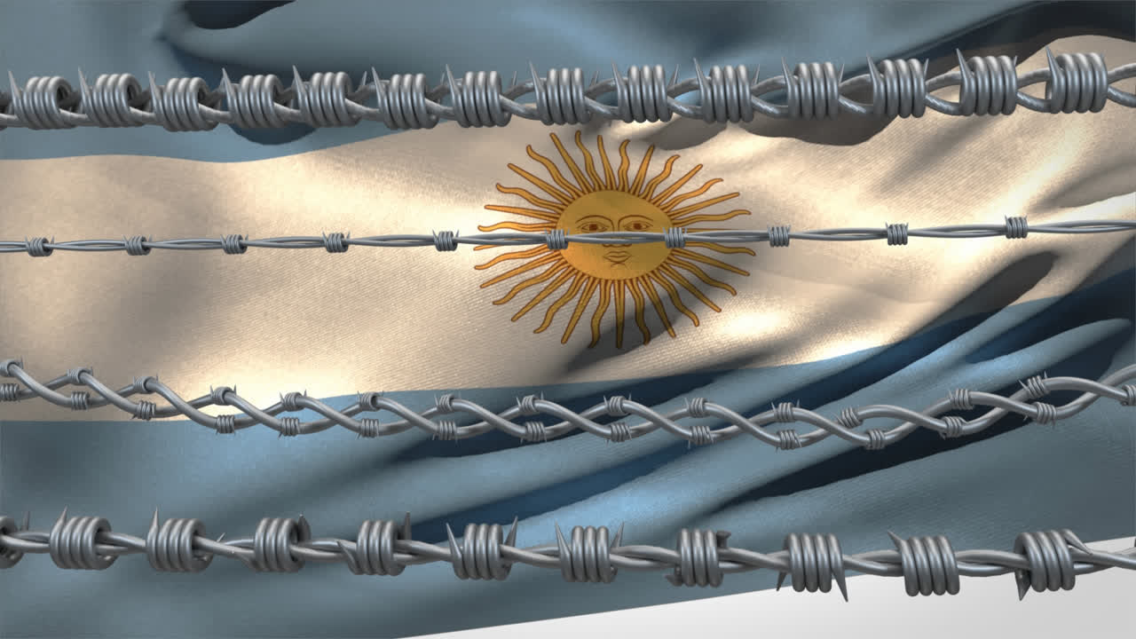 Ostnaté dráty na pozadí argentinské vlajky