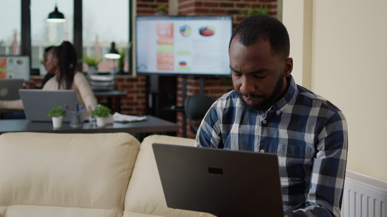 Young man working with laptop to create financial investment
