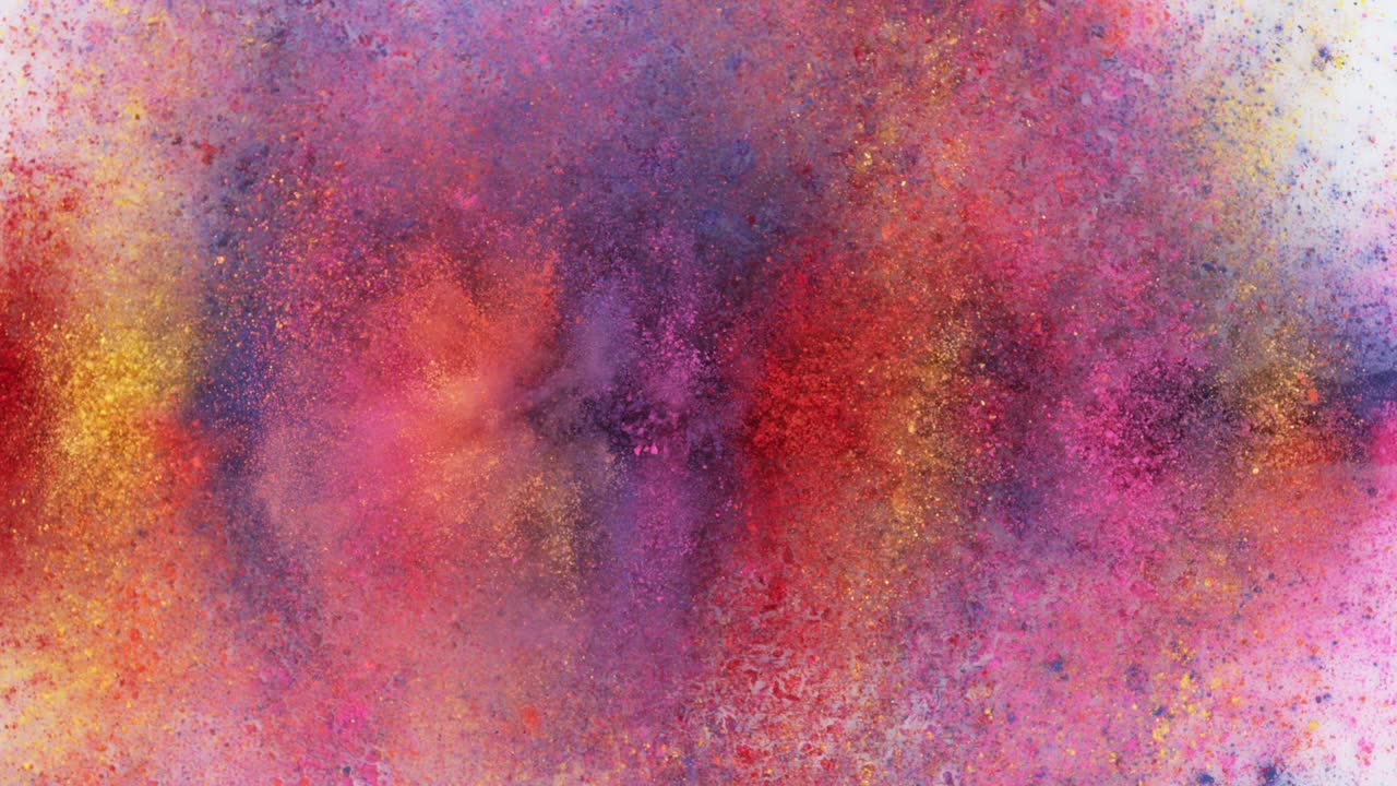 el polvo de colores explota en cámara súper lenta.