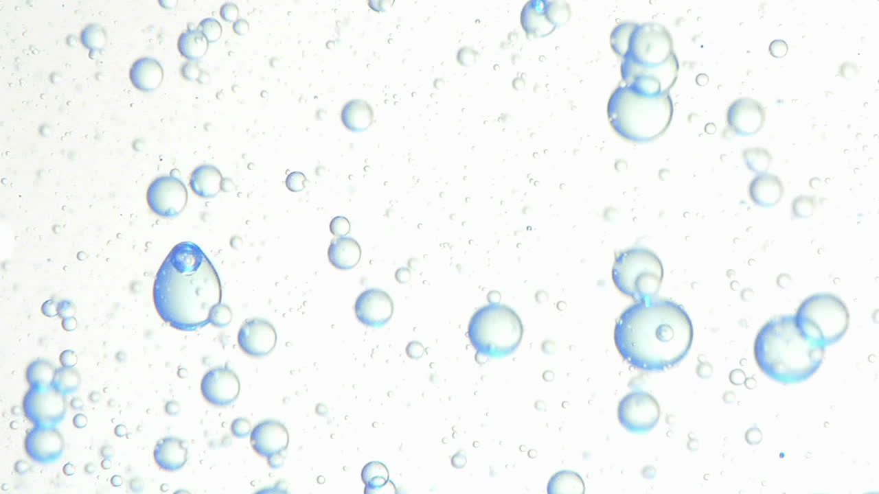 Oil bubbles form interesting liquid patterns