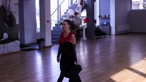 Female-dancer-stretching-before-dancing