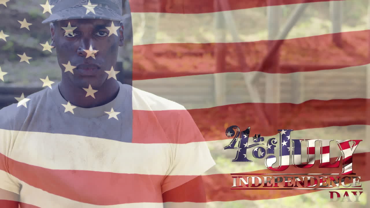 African American US soldier with US flag waving and independence date foreground